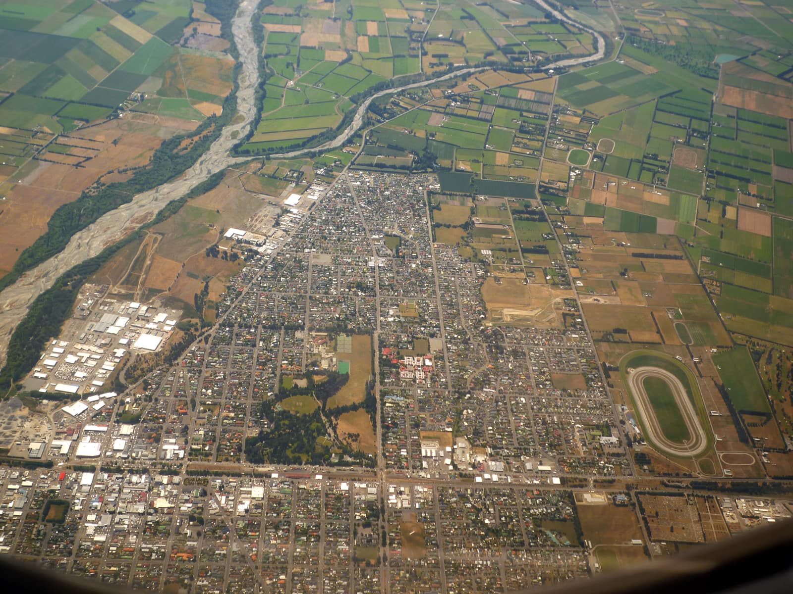 Ashburton, New Zealand: Aerial view of Ashburton, Canterbury, South Island, New Zealand, looking west. The Ashburton River or Hakatere is visible at left.