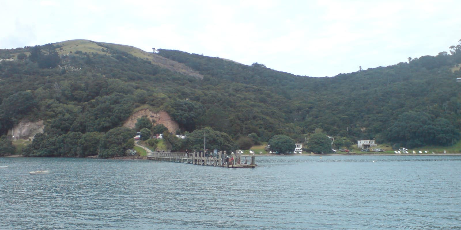 Coromandel, New Zealand: The pier where the ferry from Auckland arrives, near Coromandel Town, New Zealand. Looking southeast.